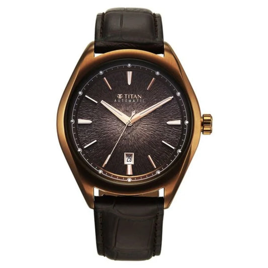 Titan watch with black leather strap and brown dial on a white background