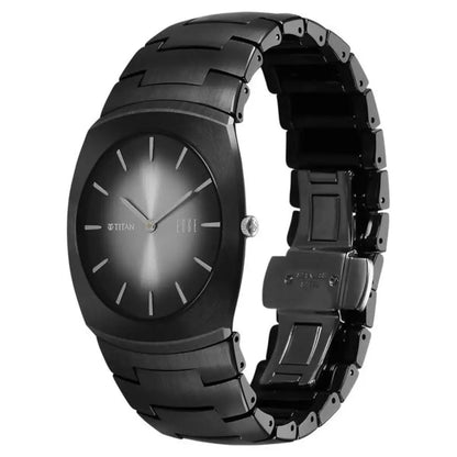 Black Titan watch with a metallic band on a white background