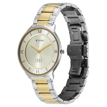 Two-tone Titan watch with gold and silver band on a white background