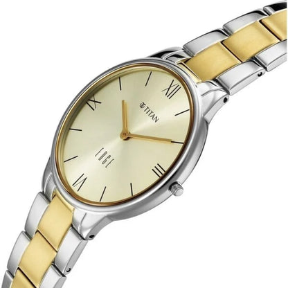 Two-tone silver and gold watch with a beige dial on a white background