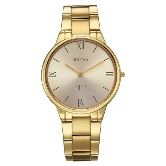 Gold wristwatch with a beige face on a white background, featuring the Titan brand.