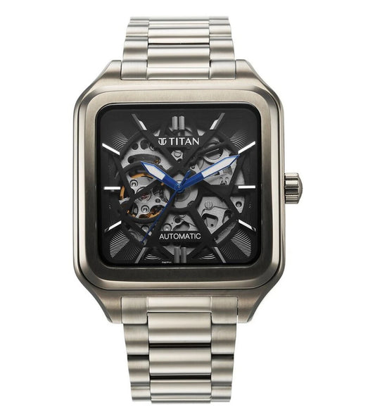 A TITAN automatic watch for men with a black square dial and a silver stainless steel strap.