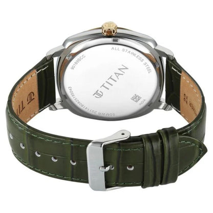 Titan watch with green leather strap and silver case on a white background