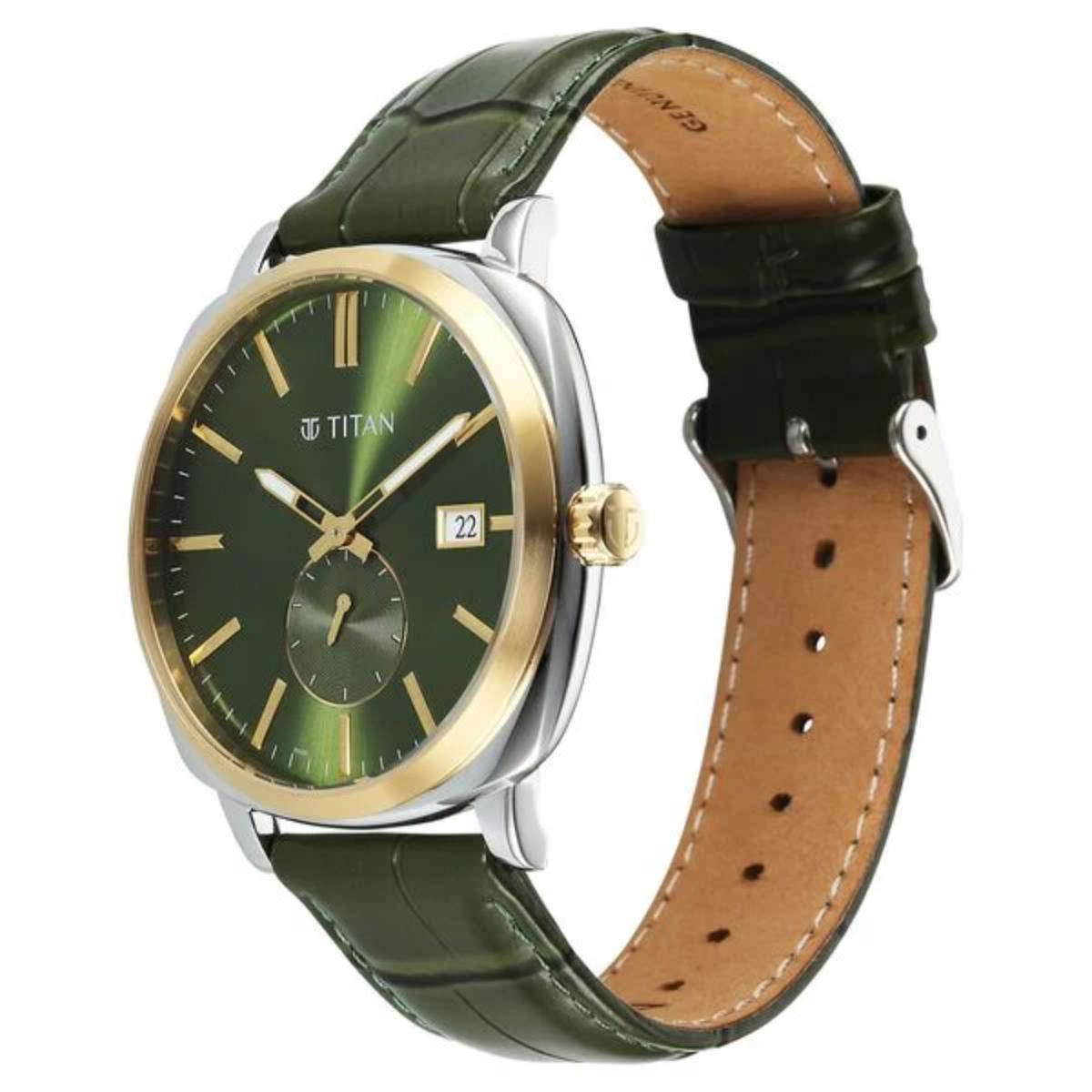 Titan watch with green face and brown leather strap on a white background
