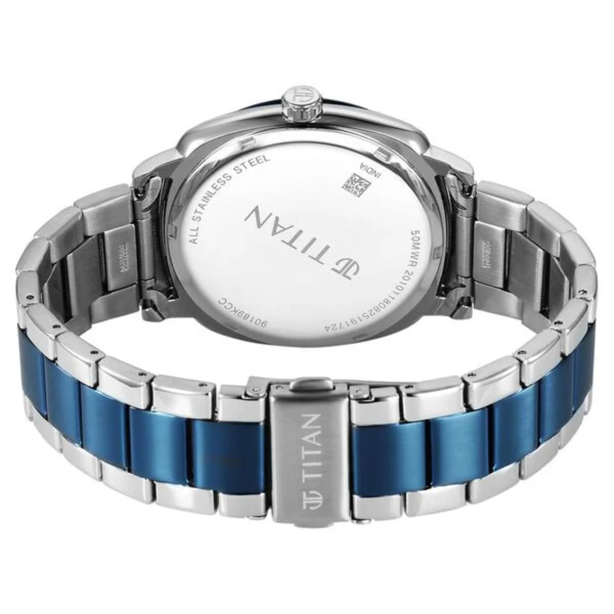 Titan watch with blue and silver band on a white background