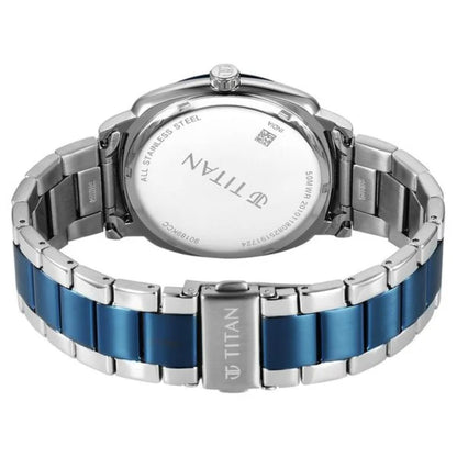 Titan watch with blue and silver band on a white background