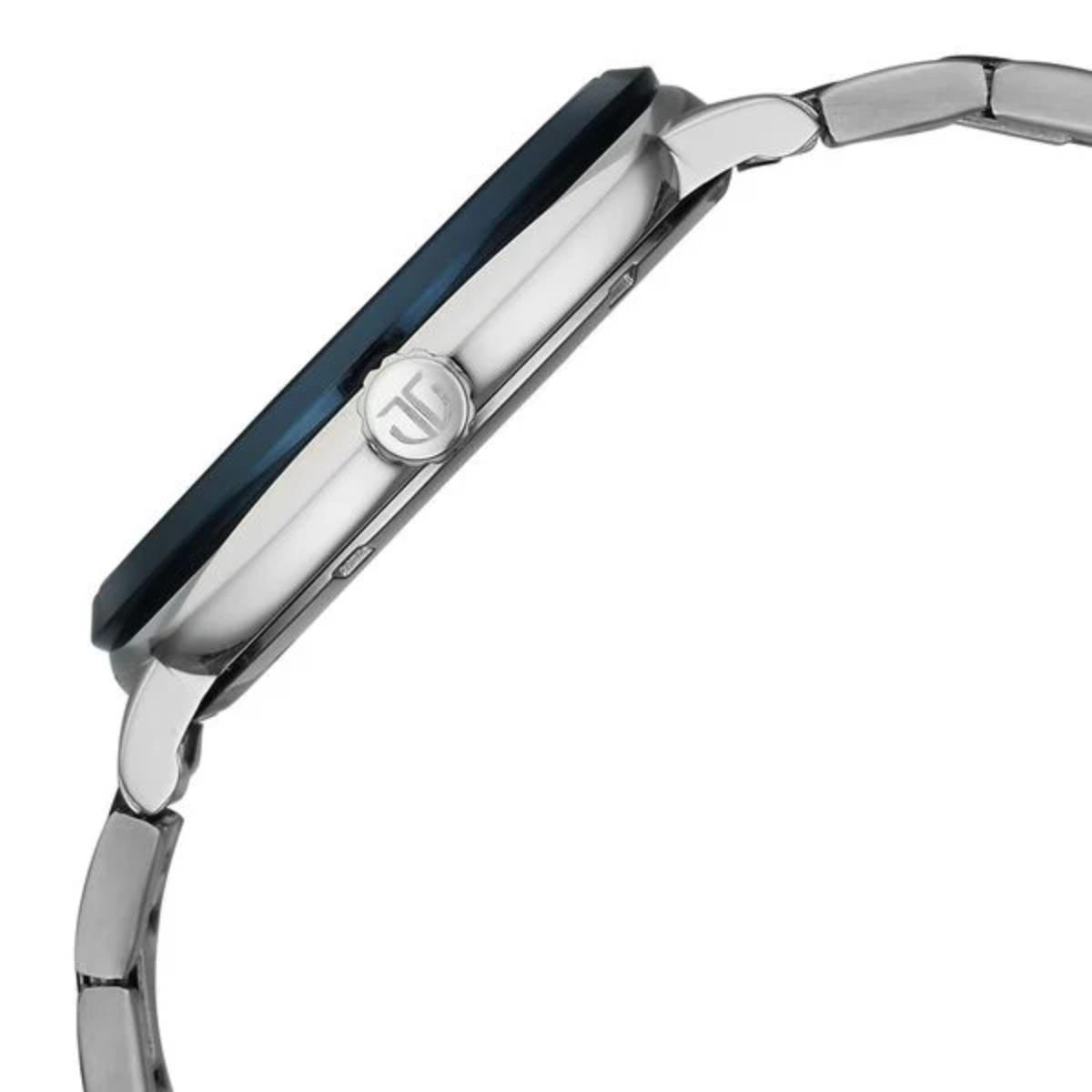 Close-up of a silver watch with a blue face on a white background