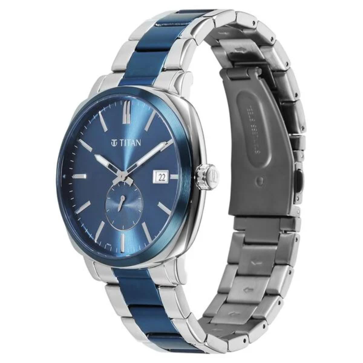 Titan watch with blue and silver band on a white background
