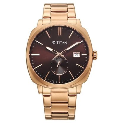 Gold Titan watch with a dark brown dial on a white background