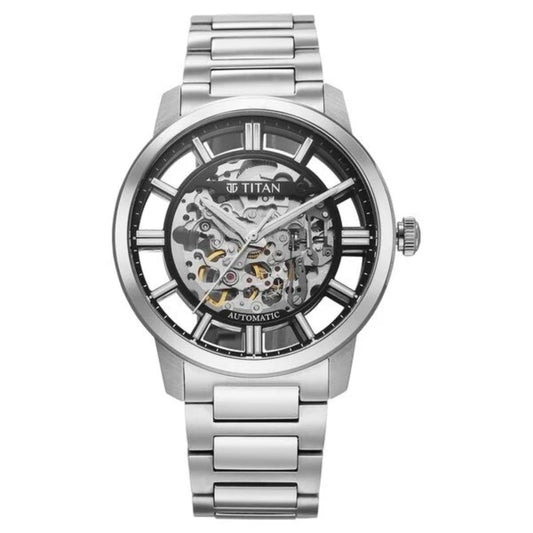 Titan watch with silver metal strap and transparent face on a white background