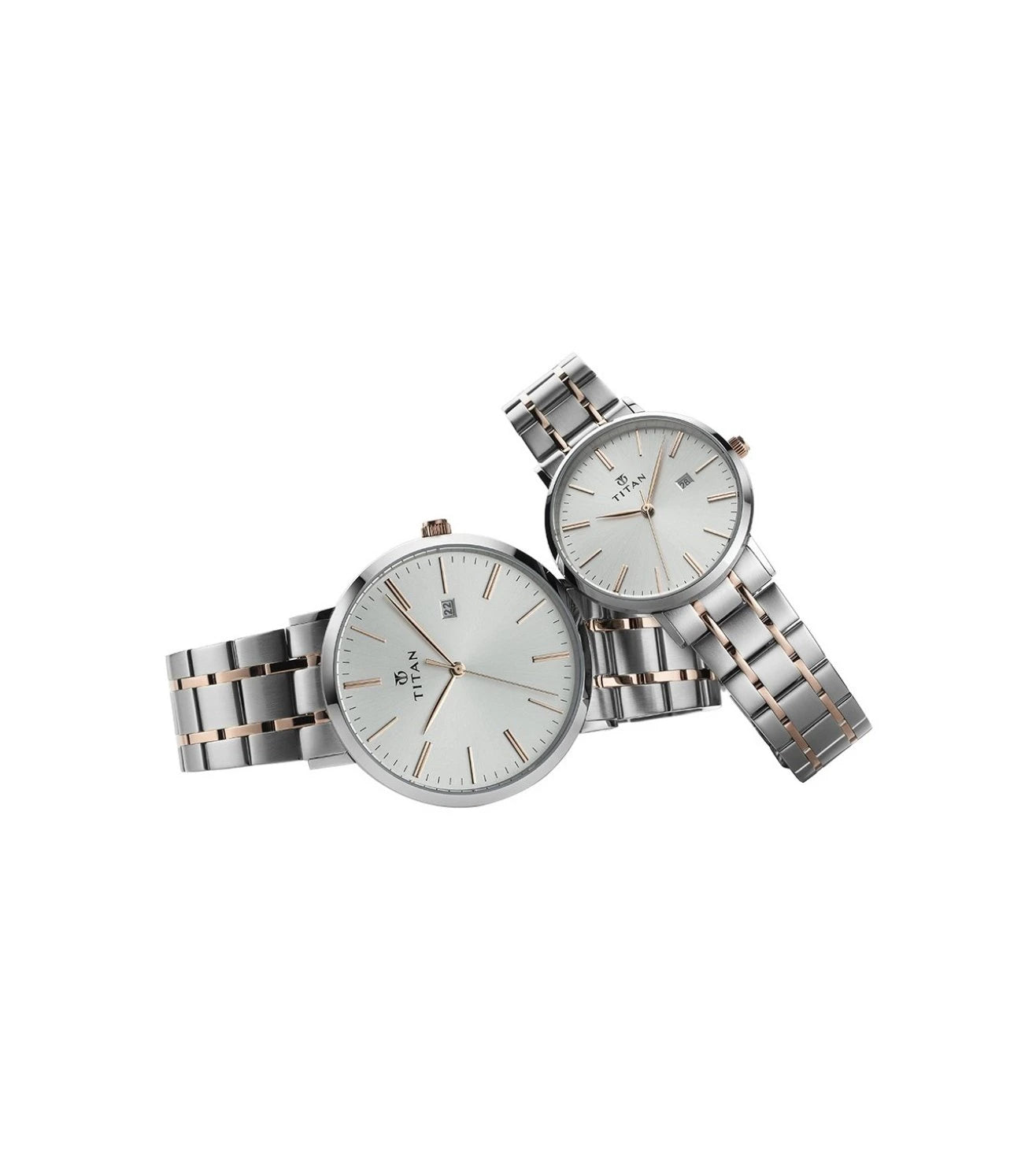 A pair of TITAN analog couple watches with silver straps and silver-white round dials, featuring three hands, stick indices, and a date display window.