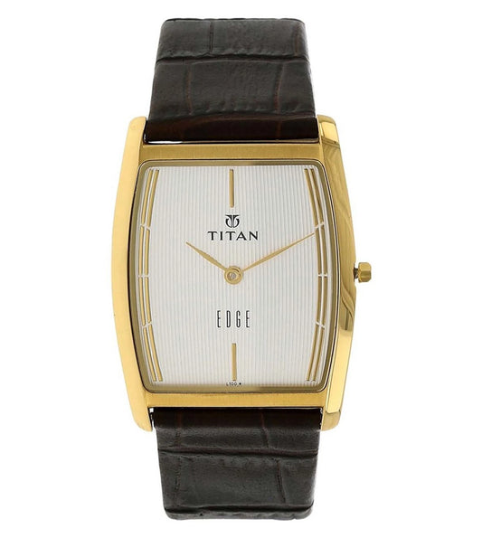 A TITAN Edge analog watch for men with a gold-colored case, white dial, and a brown leather strap.