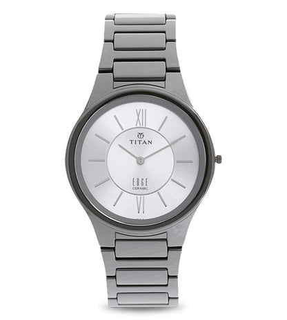 A silver-colored TITAN Edge analog watch with a ceramic strap and a round dial, featuring Roman & stick dial type, displayed against a white background.
