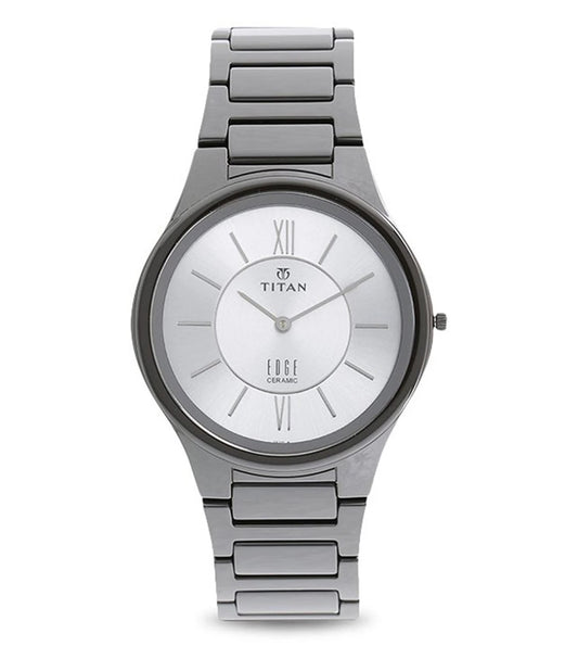 A silver-colored TITAN Edge analog watch with a ceramic strap and a round dial, featuring Roman & stick dial type, displayed against a white background.