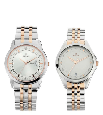 A pair of TITAN branded watches, one with a silver case and silver dial, and the other with a silver case and rose gold dial, both accompanied by two-tone stainless steel straps.