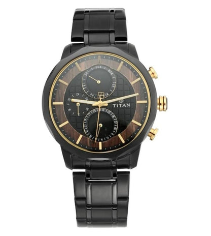 A black TITAN Grandmaster Chronograph watch with a black stainless steel strap and a black round dial with gold accents.