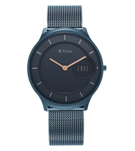 A blue TITAN Edge Baseline analog watch with a stainless steel strap and a sapphire crystal glass cover.
