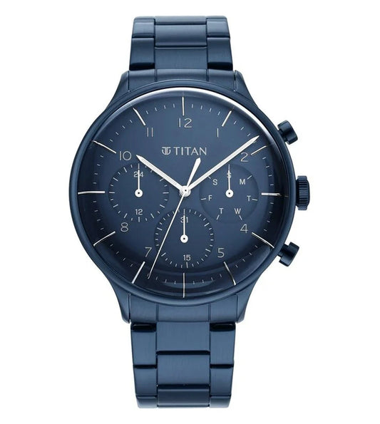 A blue TITAN Urbanic chronograph watch with a stainless steel bracelet and a blue dial featuring stick markers and a quartz movement.