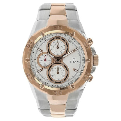 Two-tone Titan watch with rose gold and silver accents on a white background