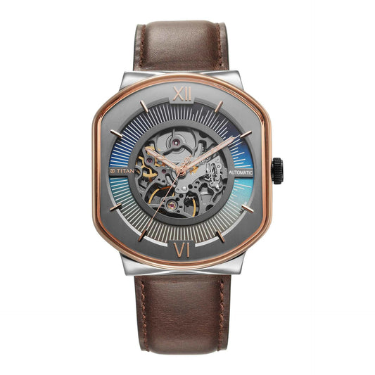A Titan Techno Beats men's watch with an anthracite dial and a brown leather strap, featuring a skeleton watch face.