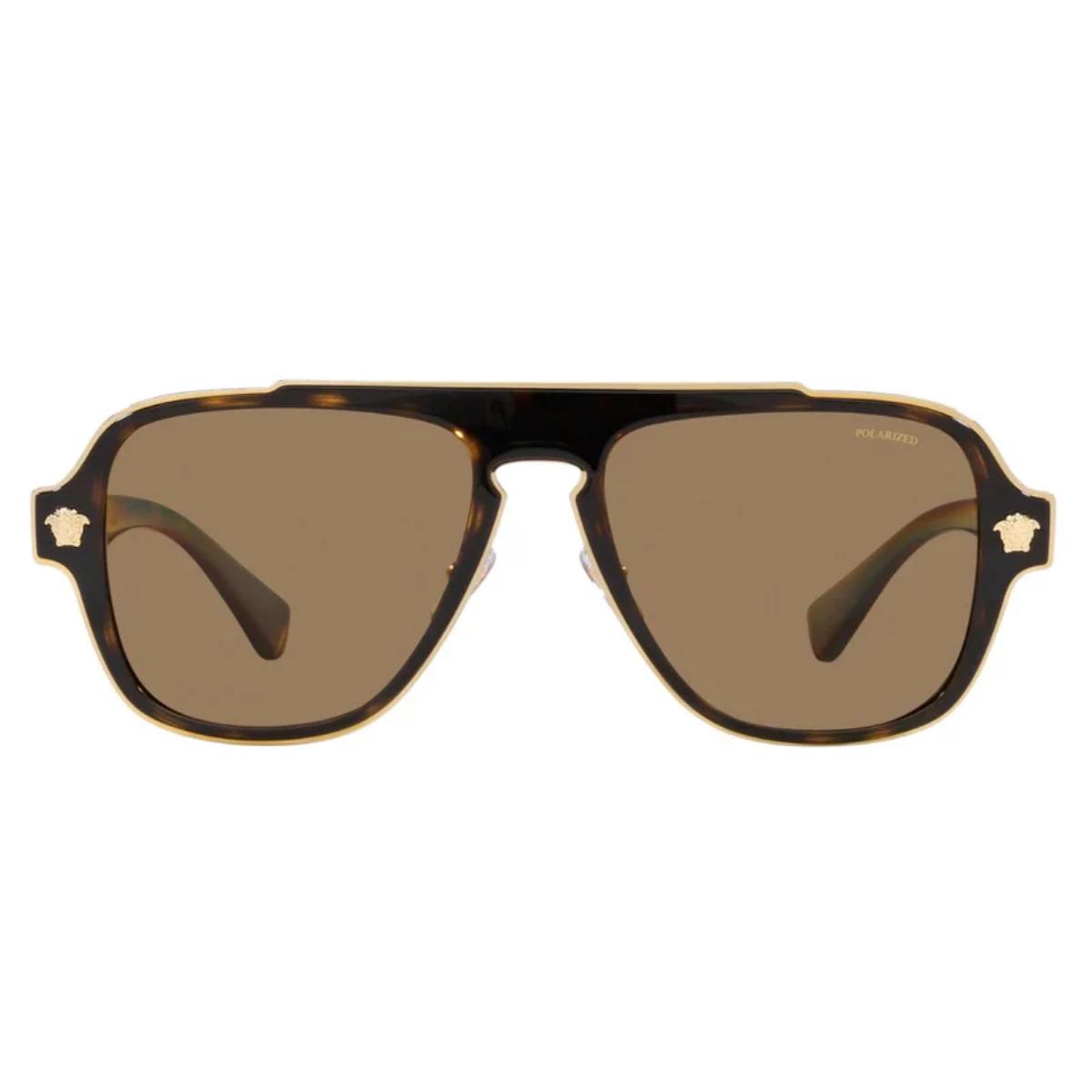 Sunglasses with tortoiseshell frame and brown lenses on a white background