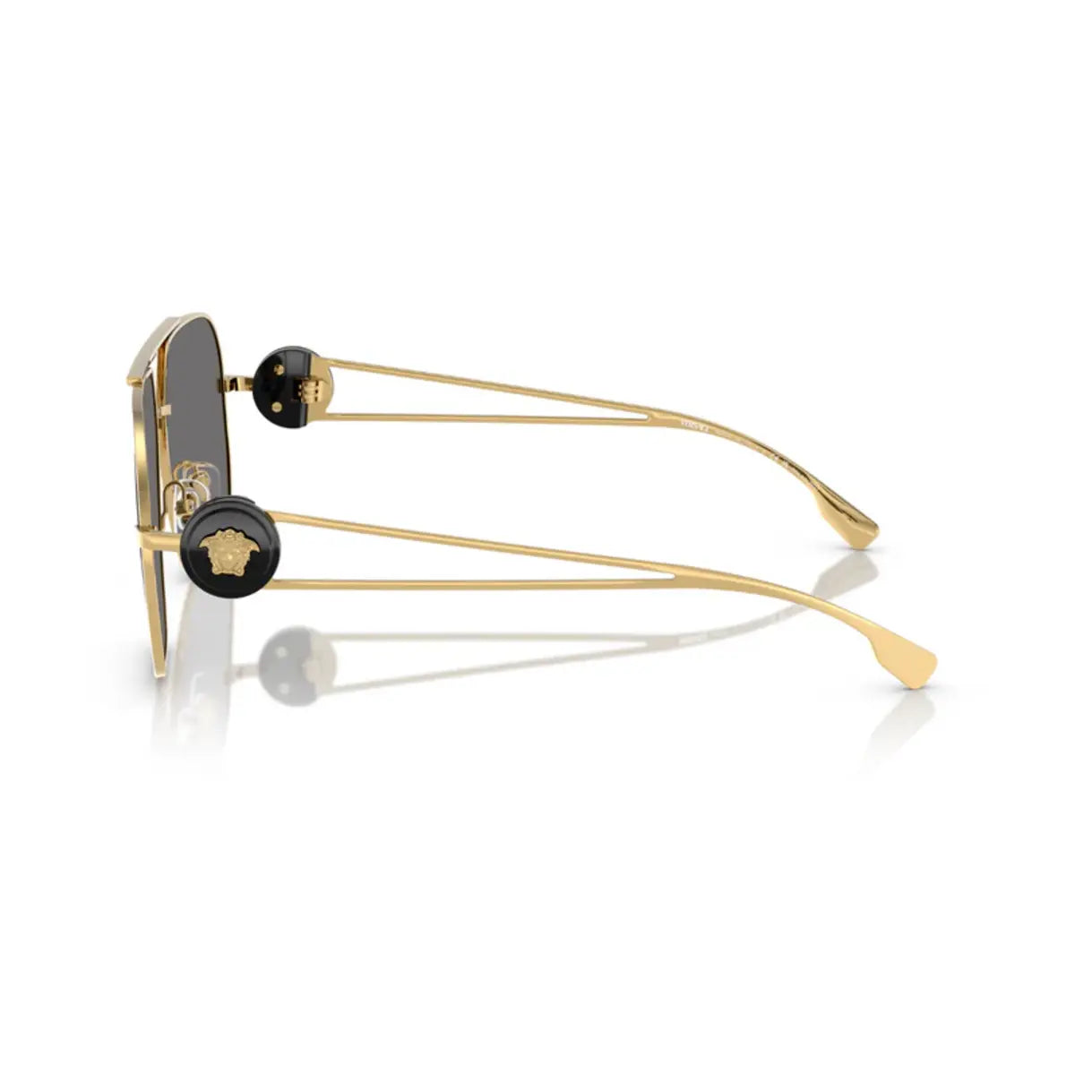 Gold sunglasses with black accents on a white background