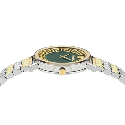 Watch with gold and silver band on a white background
