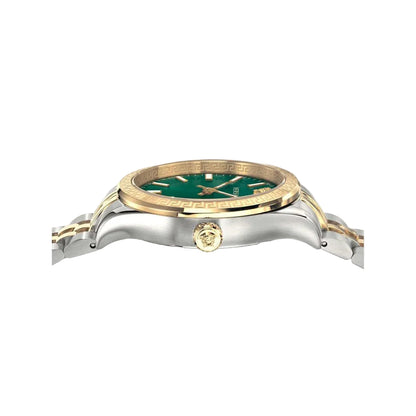 Watch with gold and silver case on a white background
