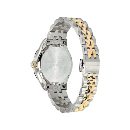 Two-tone silver and gold watch on a light gray background