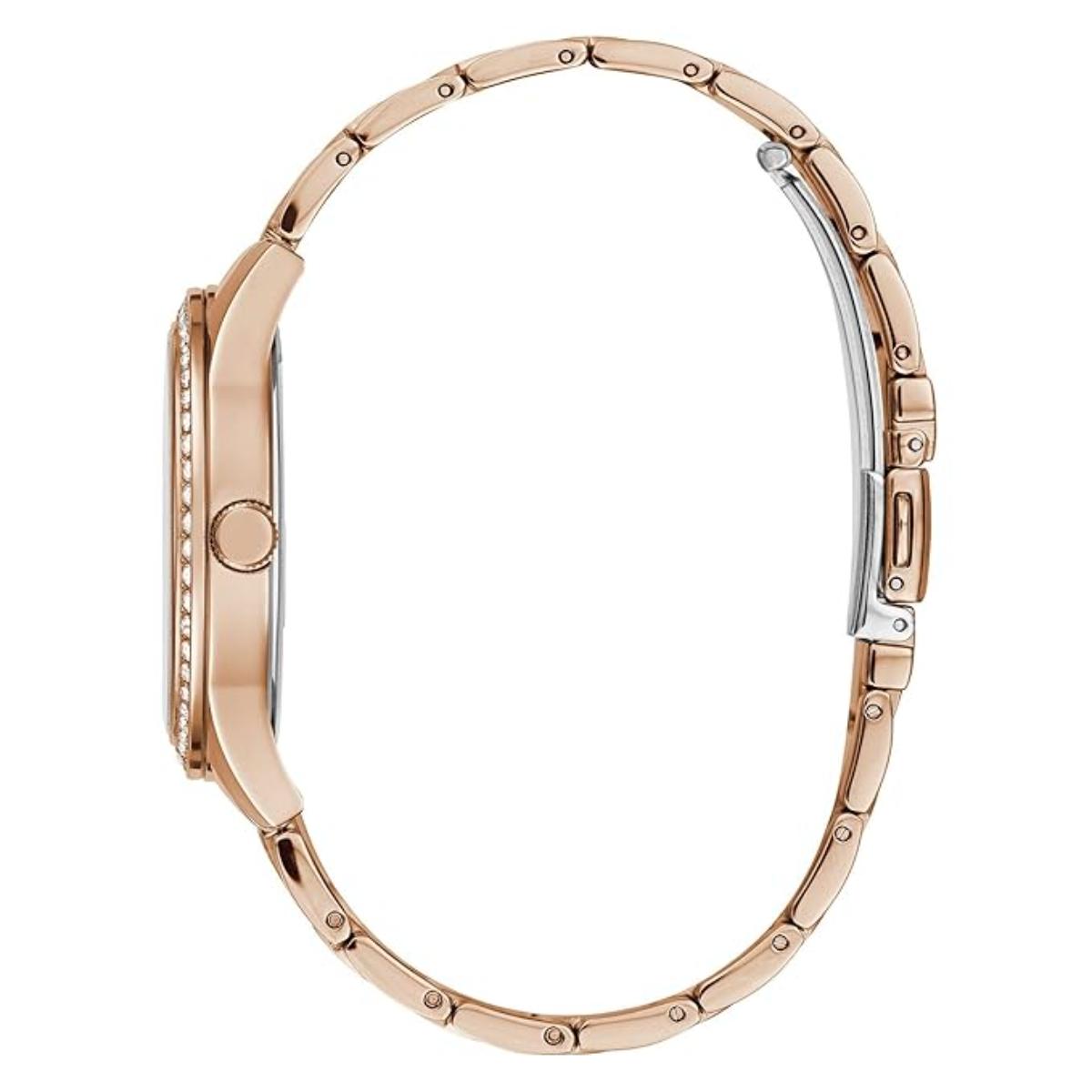Rose gold watch case on a white background