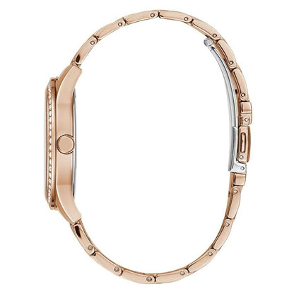 Rose gold watch case on a white background
