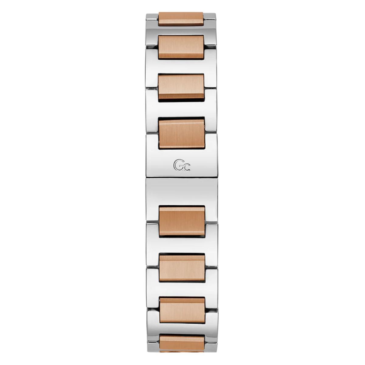 Silver and rose gold bracelet on a white background