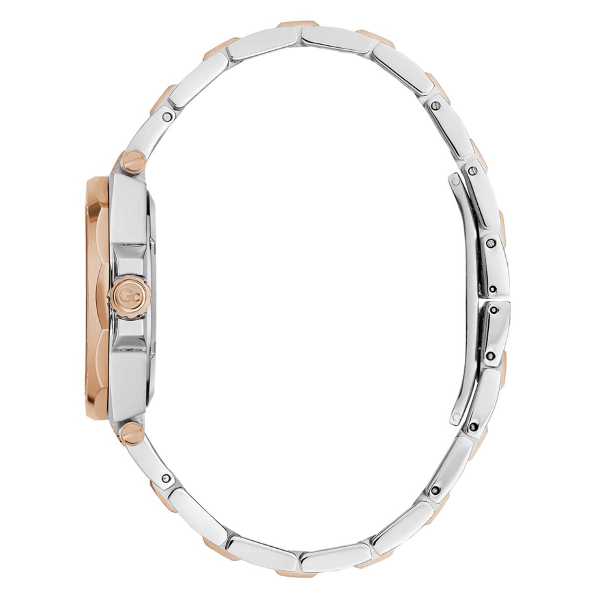 Close-up of a silver and rose gold watch band on a white background