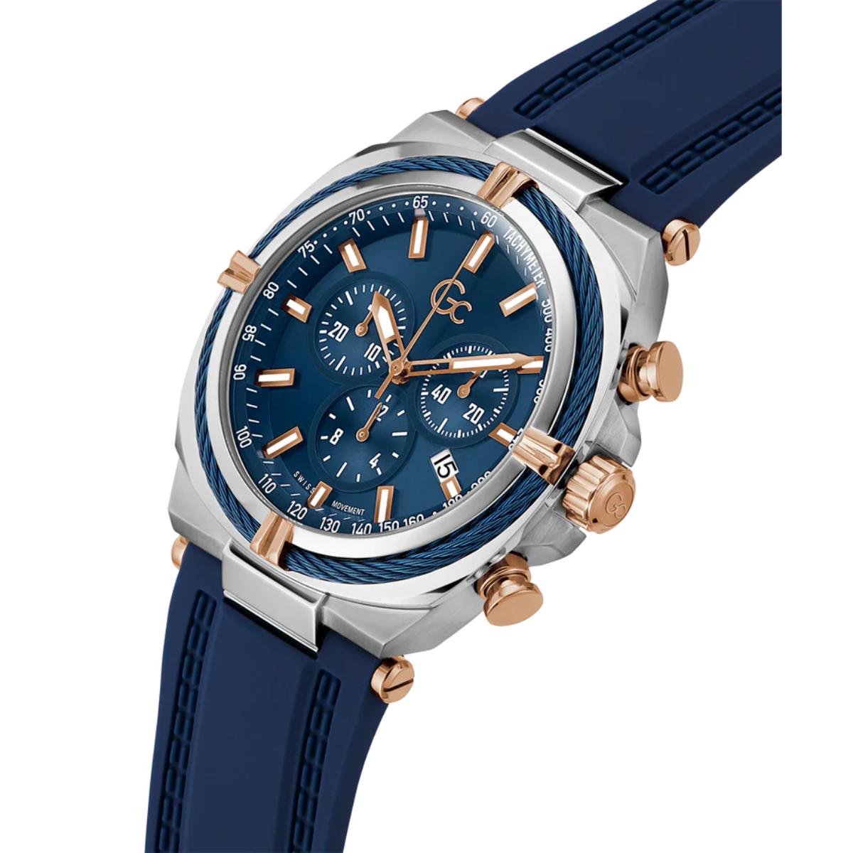 Wristwatch with blue strap and blue dial on a white background