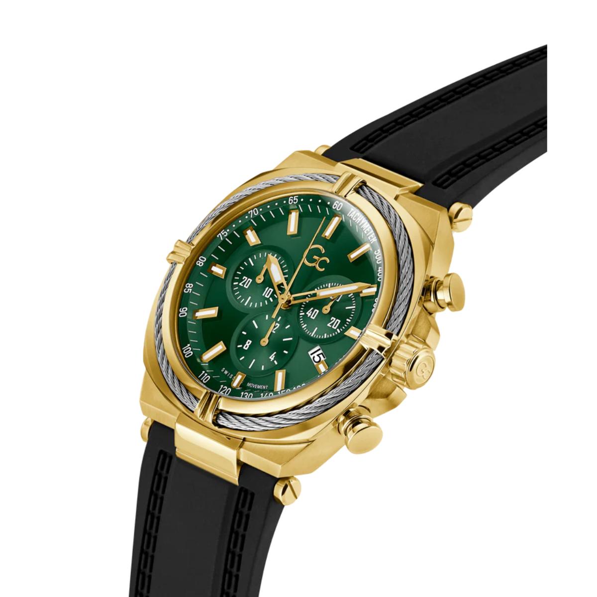 Luxury watch with green dial, gold accents, and black strap on a white background