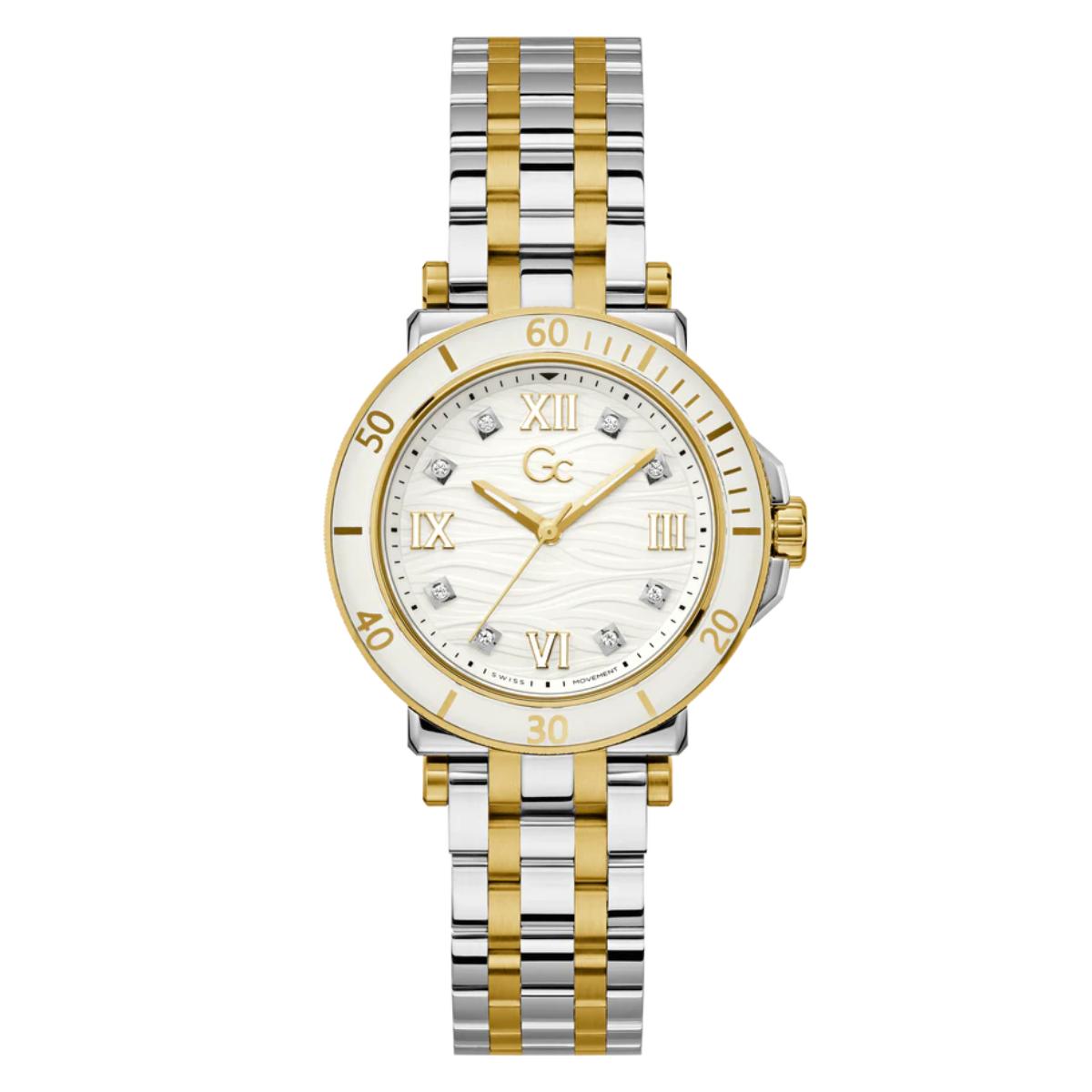 Two-tone watch with gold and silver band on a white background