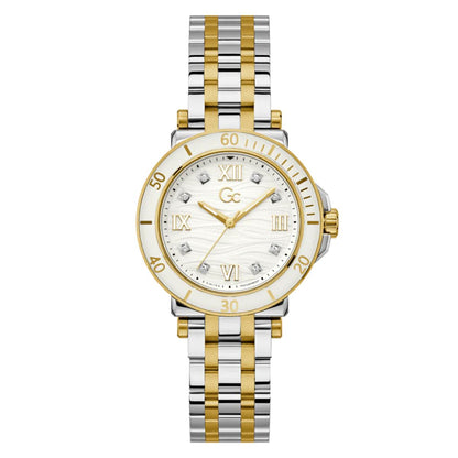 Two-tone watch with gold and silver band on a white background