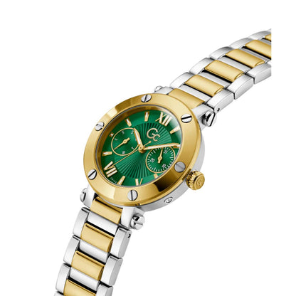 Two-tone gold and silver watch with a green face on a white background