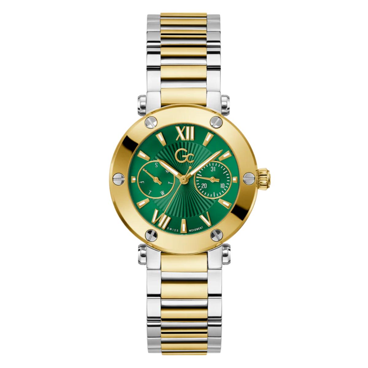 Two-tone gold and silver watch with a green face on a white background