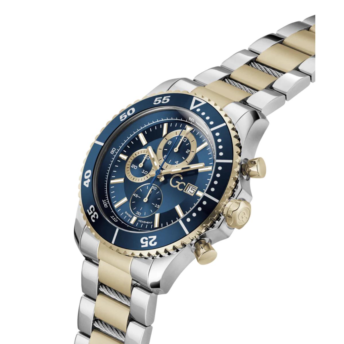 Two-tone watch with blue face and silver and gold band on white background