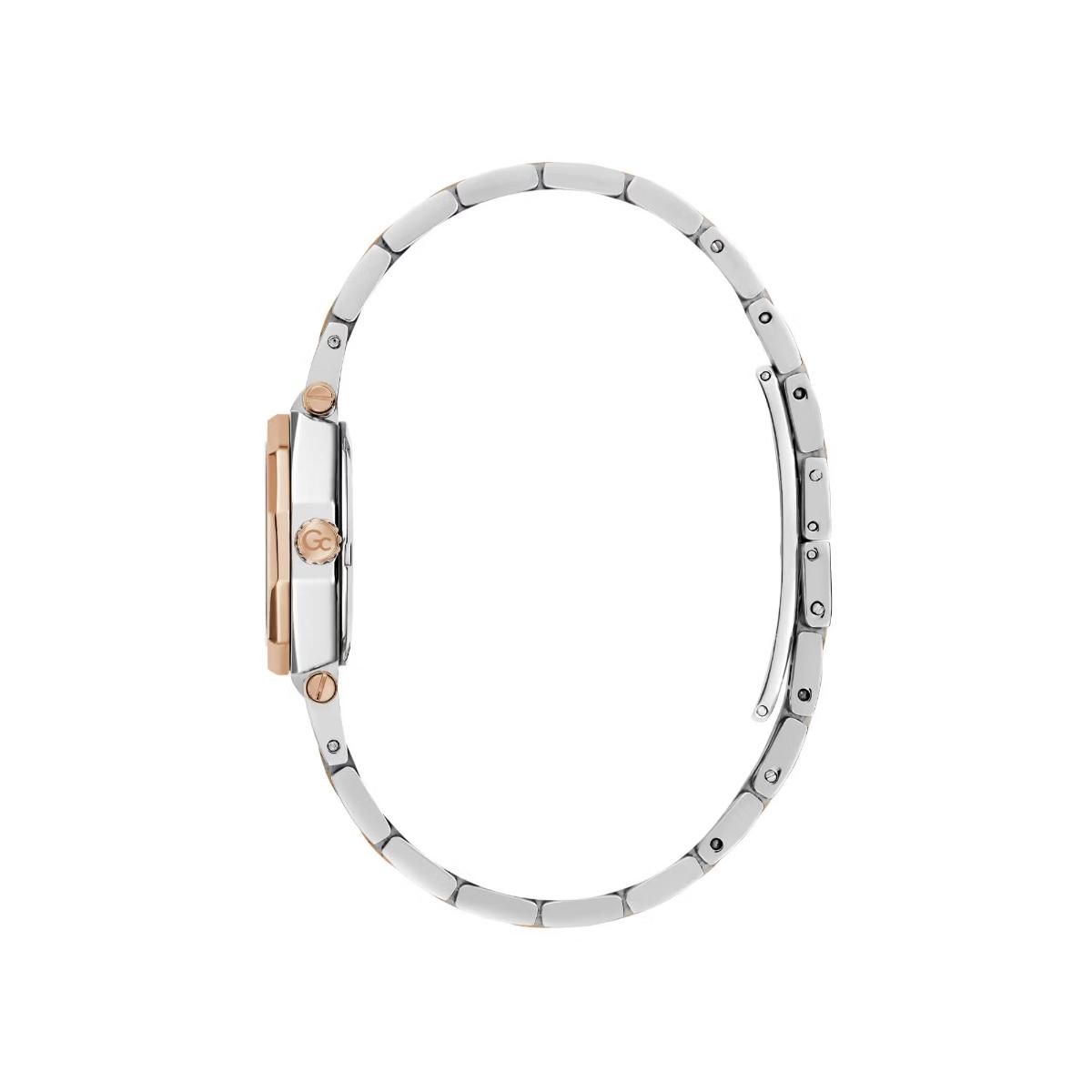 Silver bracelet with rose gold accents on a white background