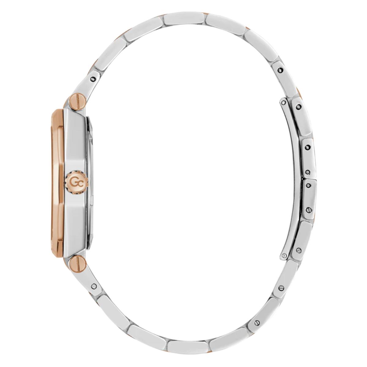 Close-up of a silver and rose gold watch band on a white background