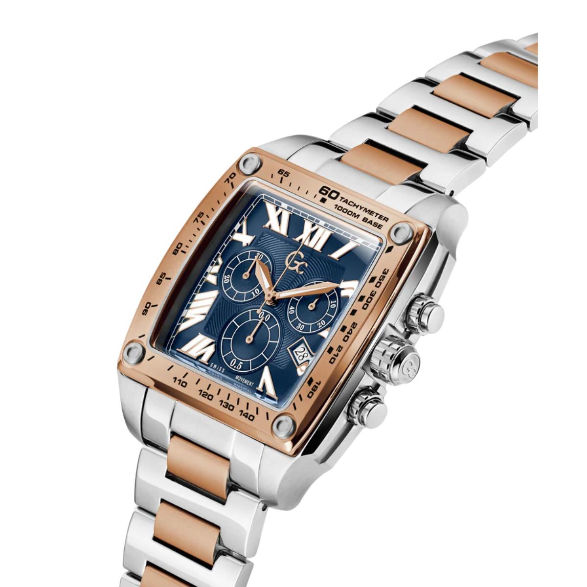 Luxury watch with a blue face and rose gold accents on a white background