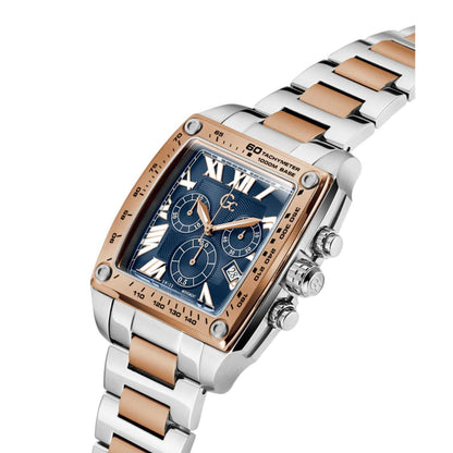 Luxury watch with a blue face and rose gold accents on a white background