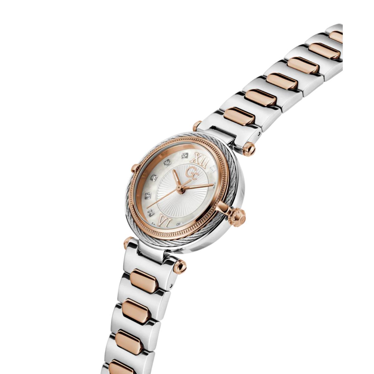 Wristwatch with two-tone rose gold and silver bracelet on a white background