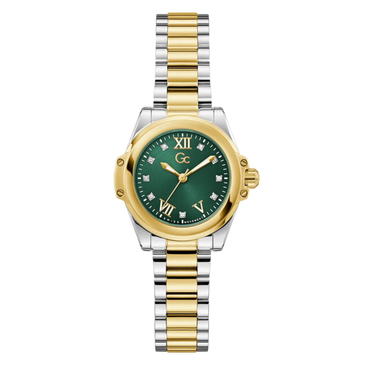 Two-tone watch with green dial and gold accents on a white background