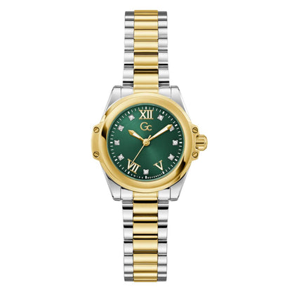 Two-tone watch with green dial and gold accents on a white background
