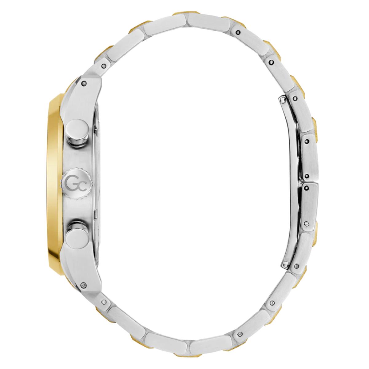 Close-up of a watch band with gold and silver accents on a white background