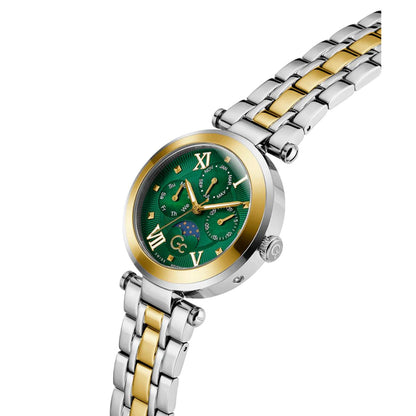 Wristwatch with green face and two-tone metal strap on white background