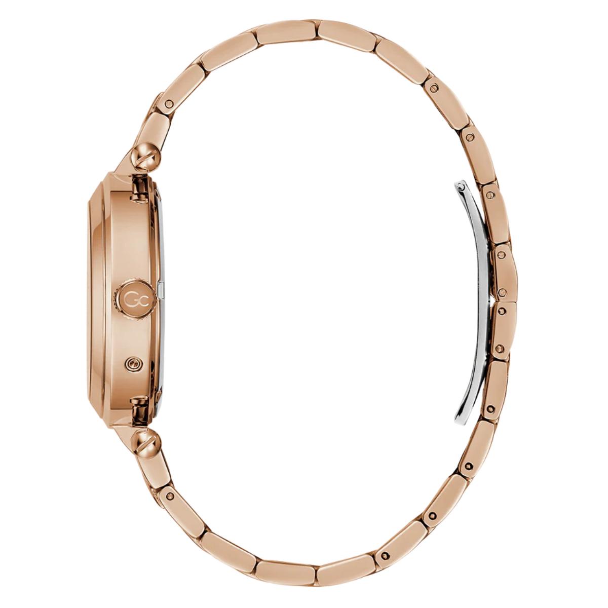 Rose gold watch with a white background